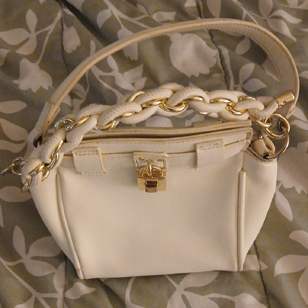 Elegant White and Gold Mini Bag With Small Pink spot Inside . Will Come Off
